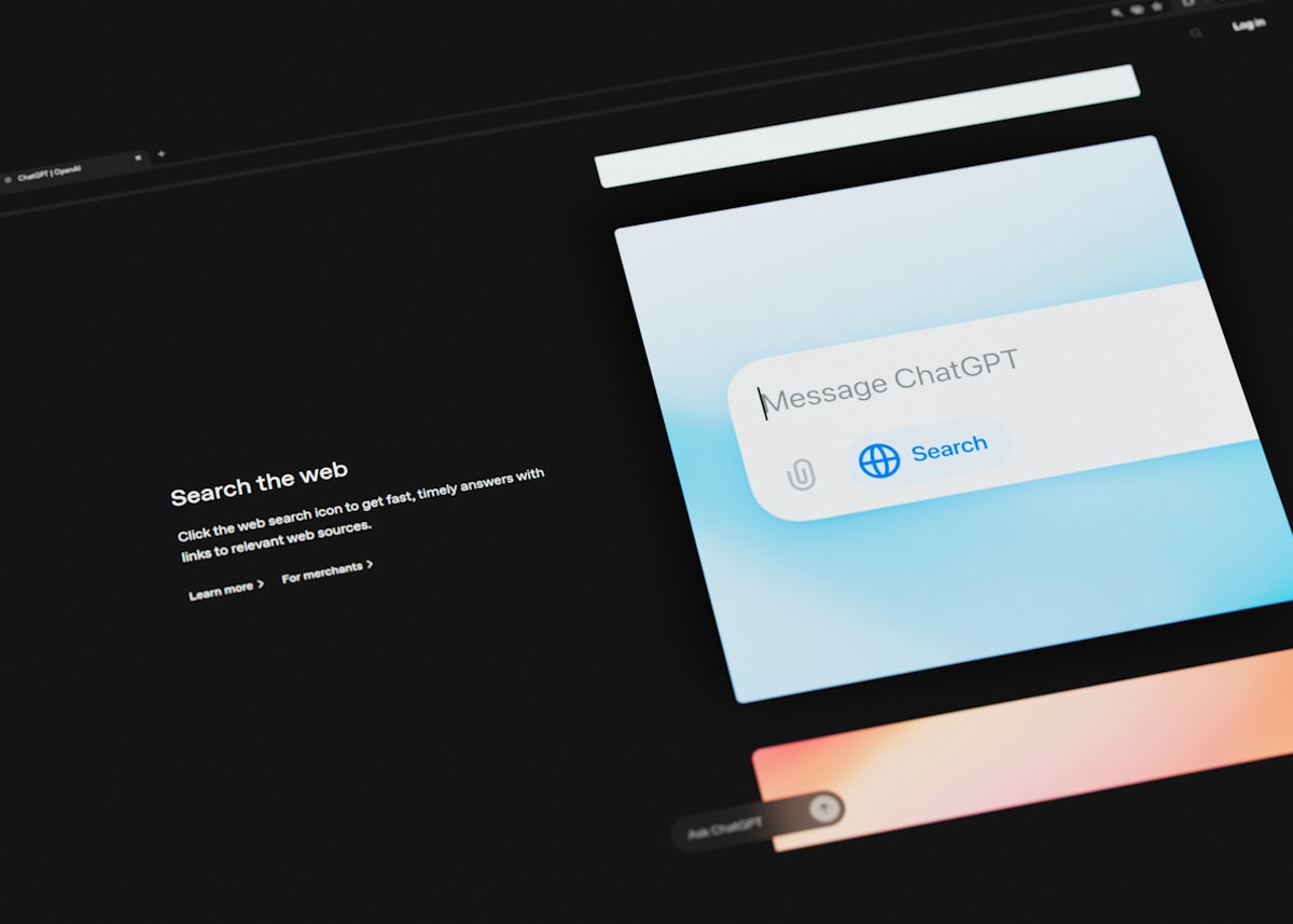A chatbot interface on a laptop screen, ready for a prompt with examples.