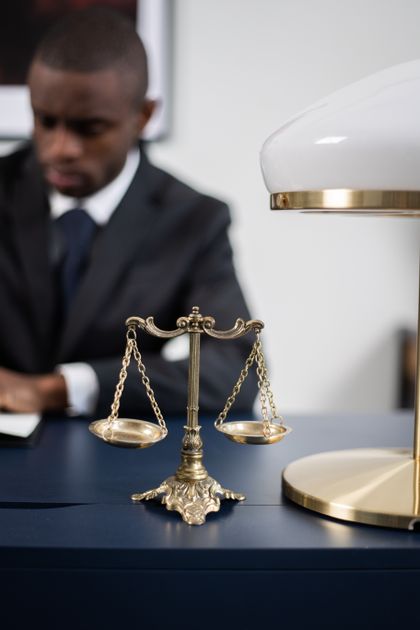 A balance scale weighing two sides, illustrating the free versus paid trade-off.