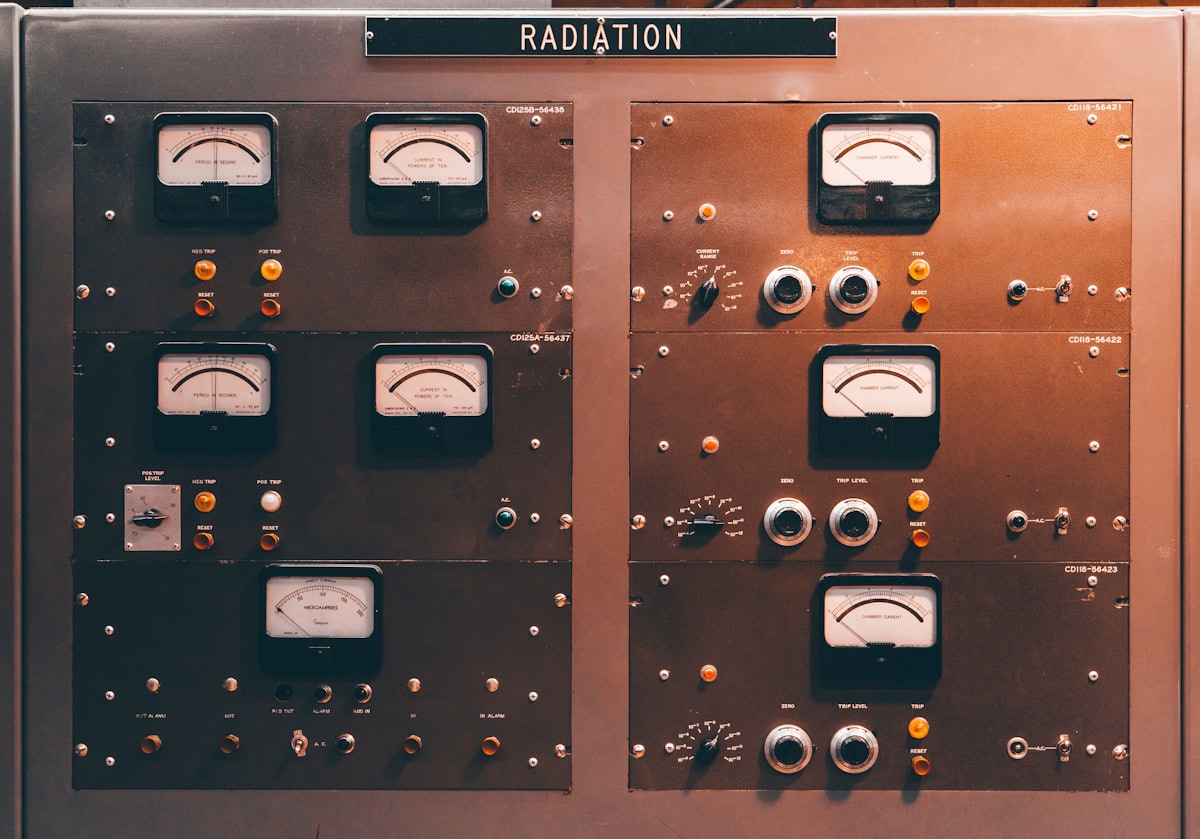 Close-up of a control panel of knobs, a metaphor for the configuration layer behind a chat.